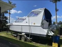 Motor boat Pelin topaz 8.5m on a launching trailer