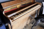 Short upright piano