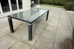 Outside dining table with glass top