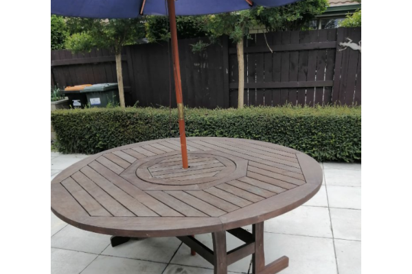 Round wooden outdoor table