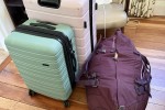 1 large suitcase 75 cm x 50 cm - 30 cm thick, Bed Head 152 cm wide 125...