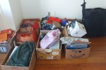 9× banana boxes of items, 2 x large bags, Box of small books, 1 small ...