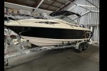 Motor boat Buccaneer 635 with dual axle trailer