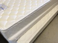 Single bed with extra pullout