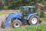 Cab tractor and front end loader with implement on back 5.4mts