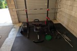 Packed Squat rack, Barbell, Gym mats and weights