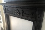 Cast iron fire surround