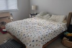 Queen bed mattress + frame, Sit/stand desk, 2 seater couch, Fridge