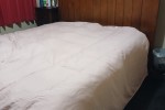 1 Queen bed, 1 chest drawers, 1 headboard and 6 banana boxes