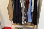 Tv flat screen 65, Clothes rack small, Rugs x 2, Box with bedding duve...