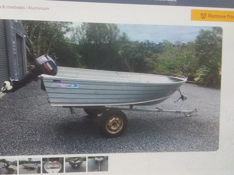 Small boat 12  ft tinny on beach trailer