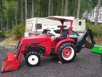 Tractor with front loader and backhoe
