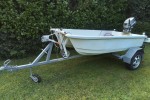Small boat dinghy on trailer