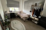 Desk, Clothes rack, A few luggage bags