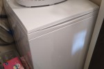 Standard fridge freezer, washing machine and wall unit 6ft high and a ...