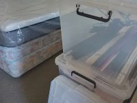 A double mattress, 6 large boxes, 9 smaller plastic cartons, 6 small c...