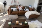 Double bed mattress with wooden frame, Three-seater couch with chaise,...
