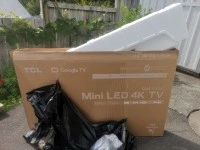 55 inch smart tv, in box.