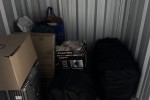 Office chair, 2 big black bags, 1 medium luggage, 3 boxes, 1 smaller i...
