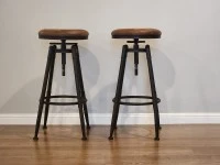 Pair of Industrial style tan and black bar stools