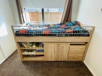 Loft bed with desk, chair & storage
