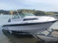 Motor boat Haine Hunter SF545 on a trailer