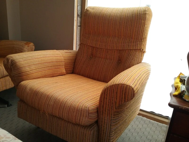 3 seater couch and 2 chairs, roll of fabric