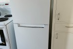 Fridge freezer, washing machi ,4 plastic containers 2/ 20 litre 2/ 40...