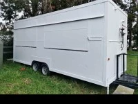 It's a twin axle food cart trailer, 7.5m long and 2.8m high