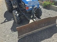 Iseki small tractor with trencher and grader