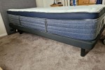 King single adjustable bed with headboard.