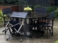 Yamaha upright piano and outdoor table set with four chairs