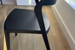 Two plastic stacking dining chairs (2)