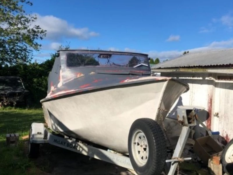 Trailer with boat