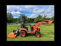 Very small Kubota tractor with mower would say 5 meters long at most