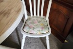 Solid timber round extendable table and four chairs