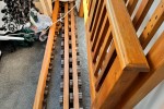 Wooden bed ends and slats and three attaching beams