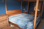 Four-poster bed and mattress disassembled
