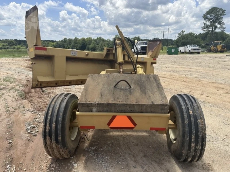 Tractor grader blade tow behind