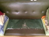 Vintage 60s-70s green vinyl three/four seater couch