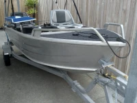 Small boat 12foot dingy on trailer current wof/reg