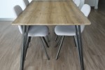 Dining table 100 x 180 cm and 4 chairs.