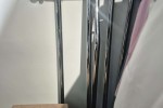 Collapsed cloths rack, small bench seat, clothing steamer, small box