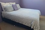 2 large couches with big cushions, queen size bed, 1 Single bed, 1 cha...