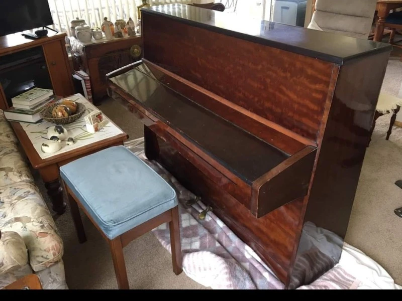 Old wooden vertical piano