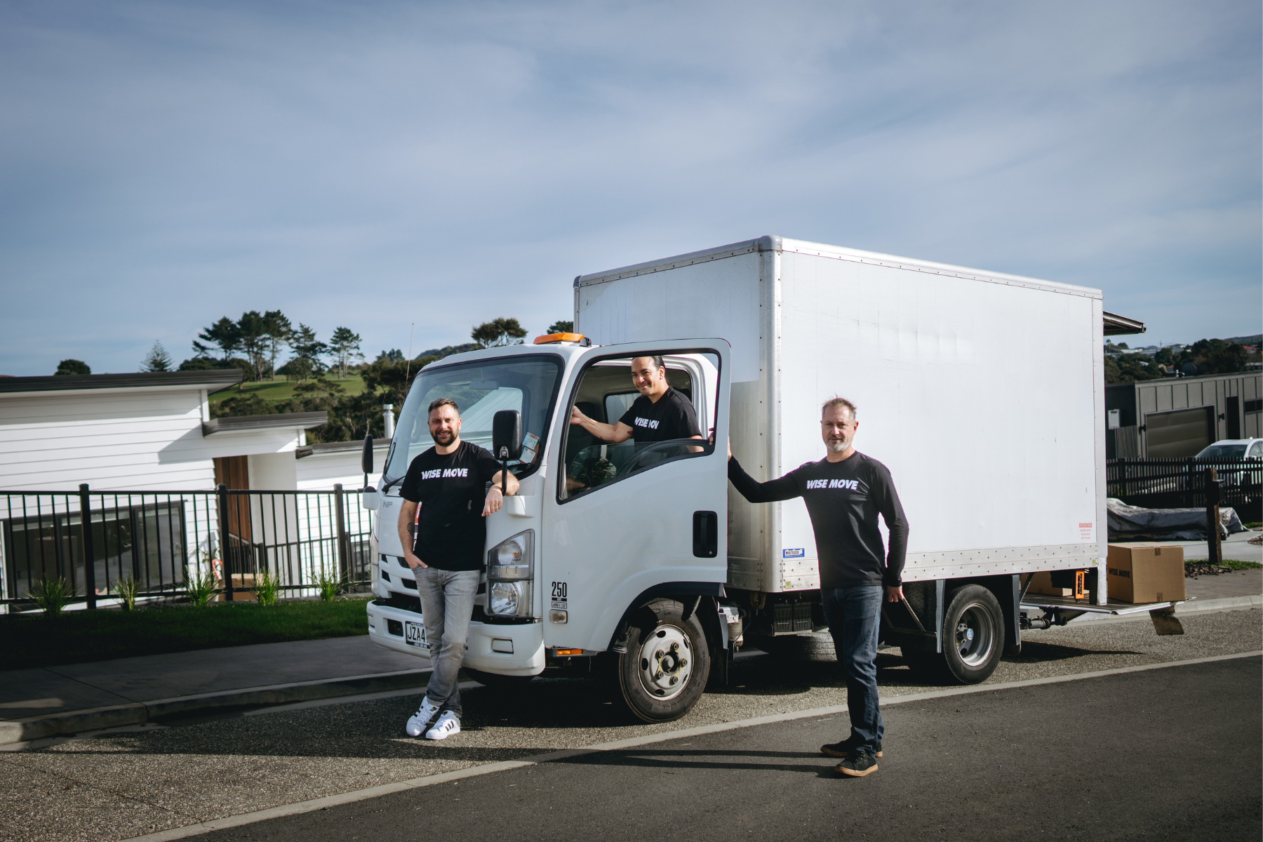 Moving company team with truck outside home for junk removal