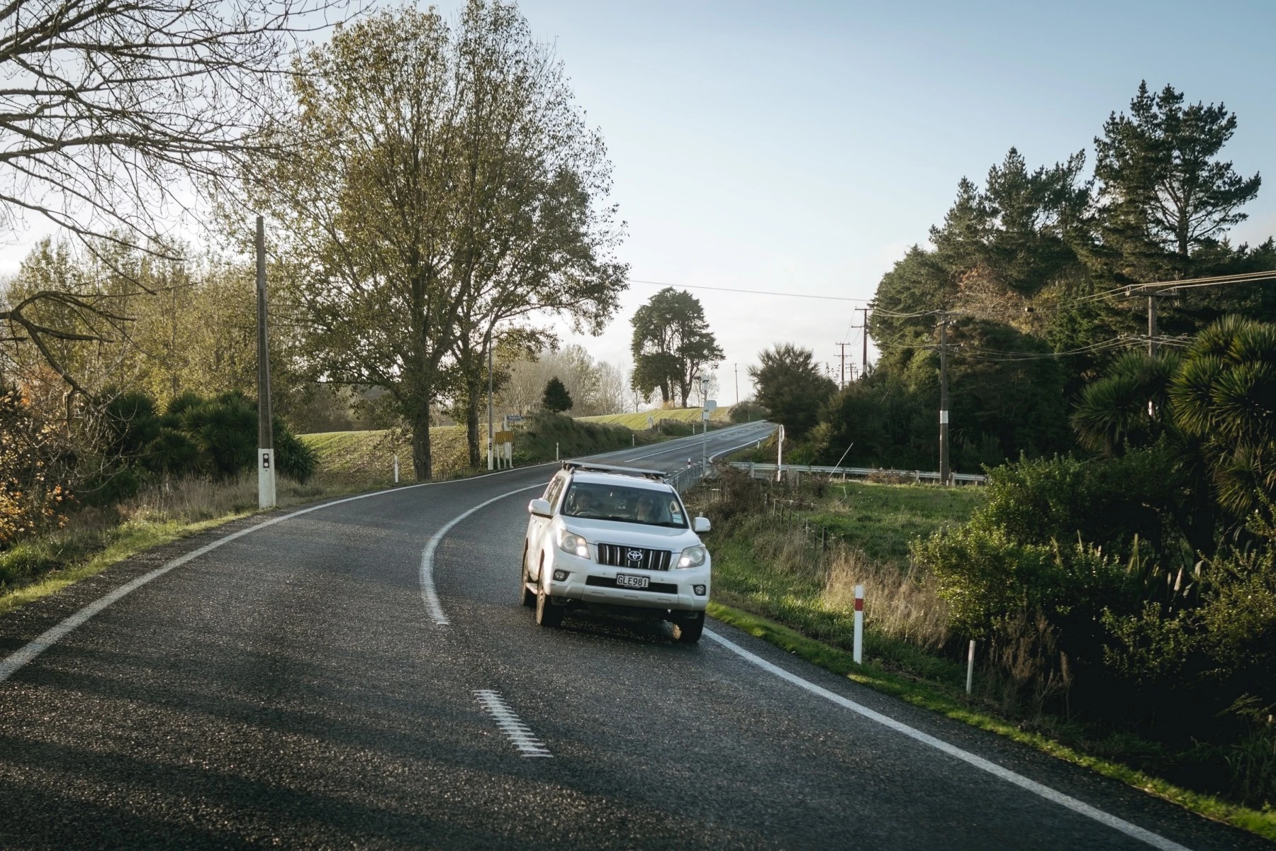 A popular Toyota car driving down road in New Zealand