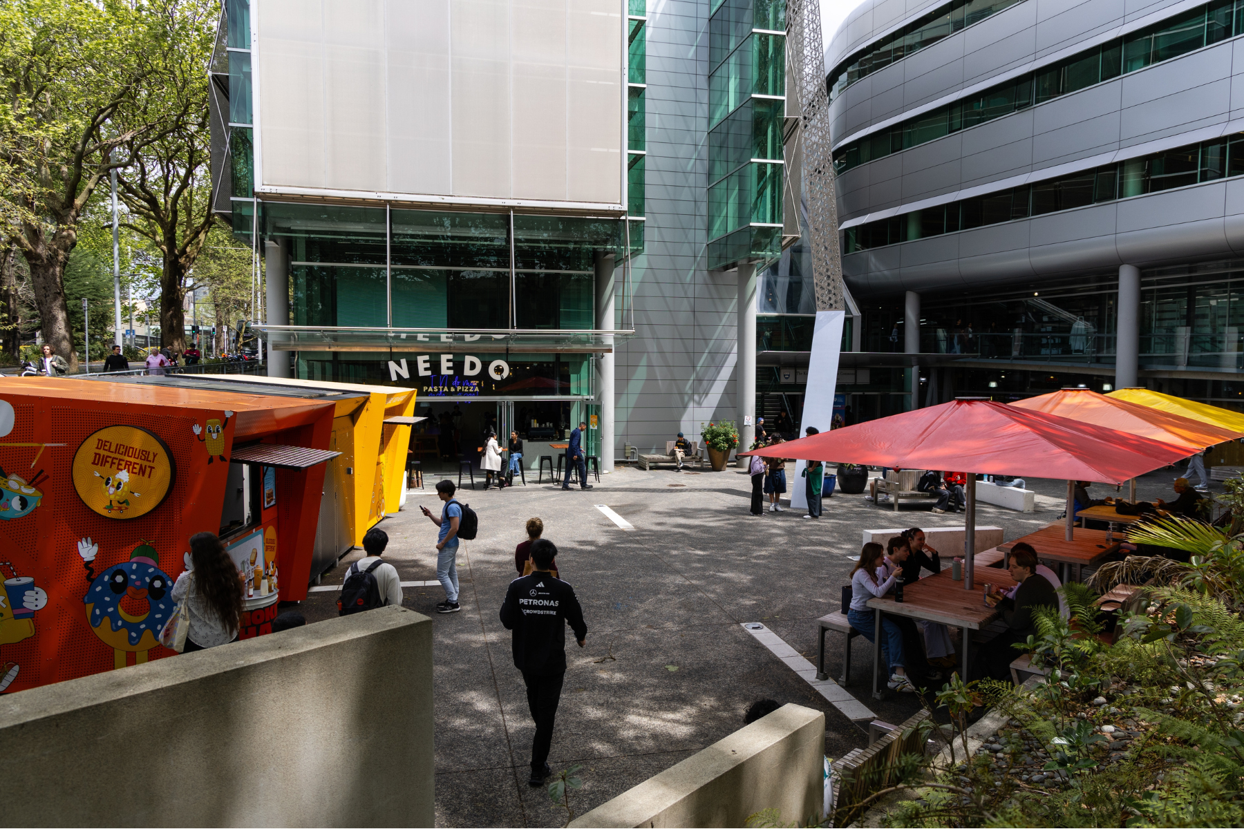 Few students walking around the University of Auckland