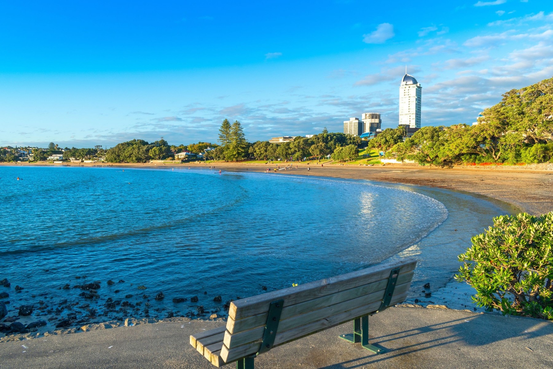 Takapuna beach with amenities and houses in the background