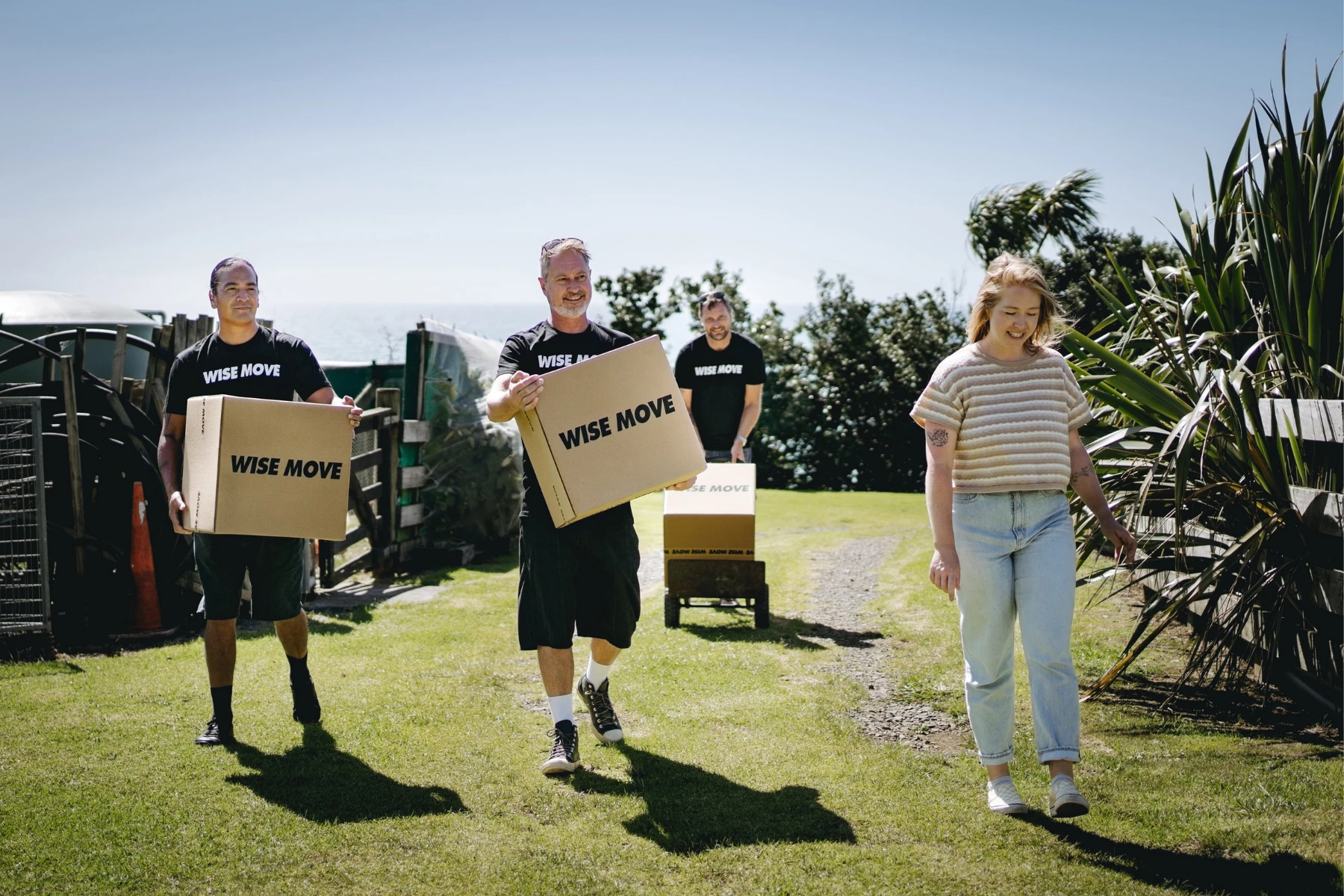 Student movers carrying a student's boxes in a student move